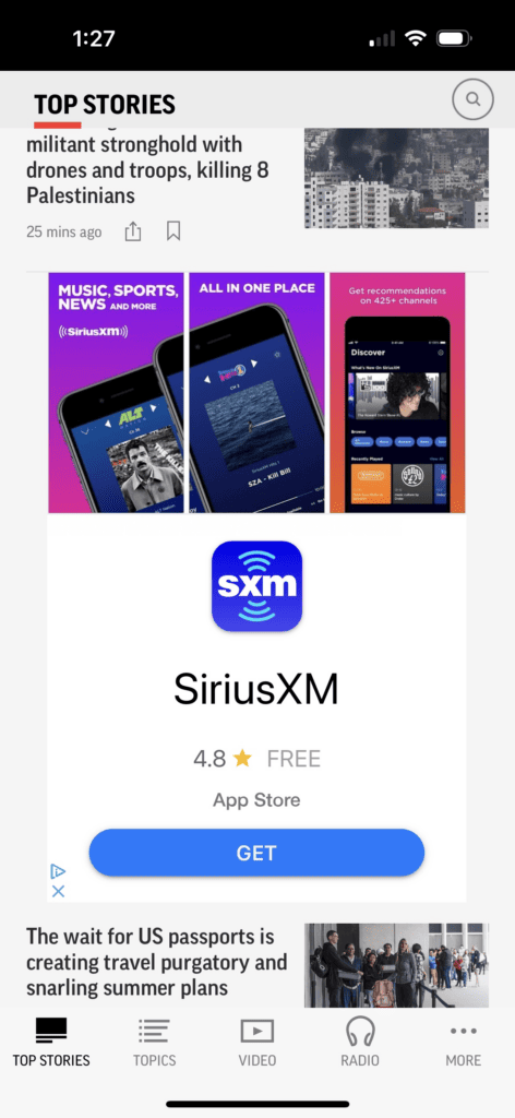  A screenshot of a mobile device, showing an App Install ad for the SiriusXM app. There are three colorful images of the app, the SiriusXM logo, and a blue button that reads: “Get”.